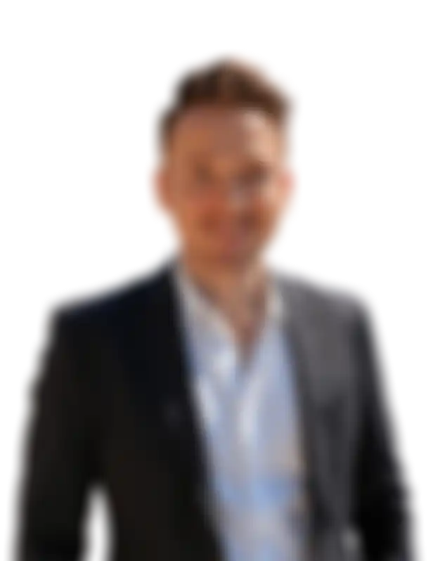 Smiling businessman in a suit standing in front of a dashboard showing affiliate earnings, revenue growth, and business stats—highlighting the benefits of joining a profitable partner program.