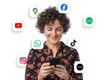 Smiling woman using her smartphone, surrounded by icons of popular apps like WhatsApp, Instagram, YouTube, Google Maps, Facebook, TikTok, Uber, and Grab—suggesting easy access to essential travel and social tools.